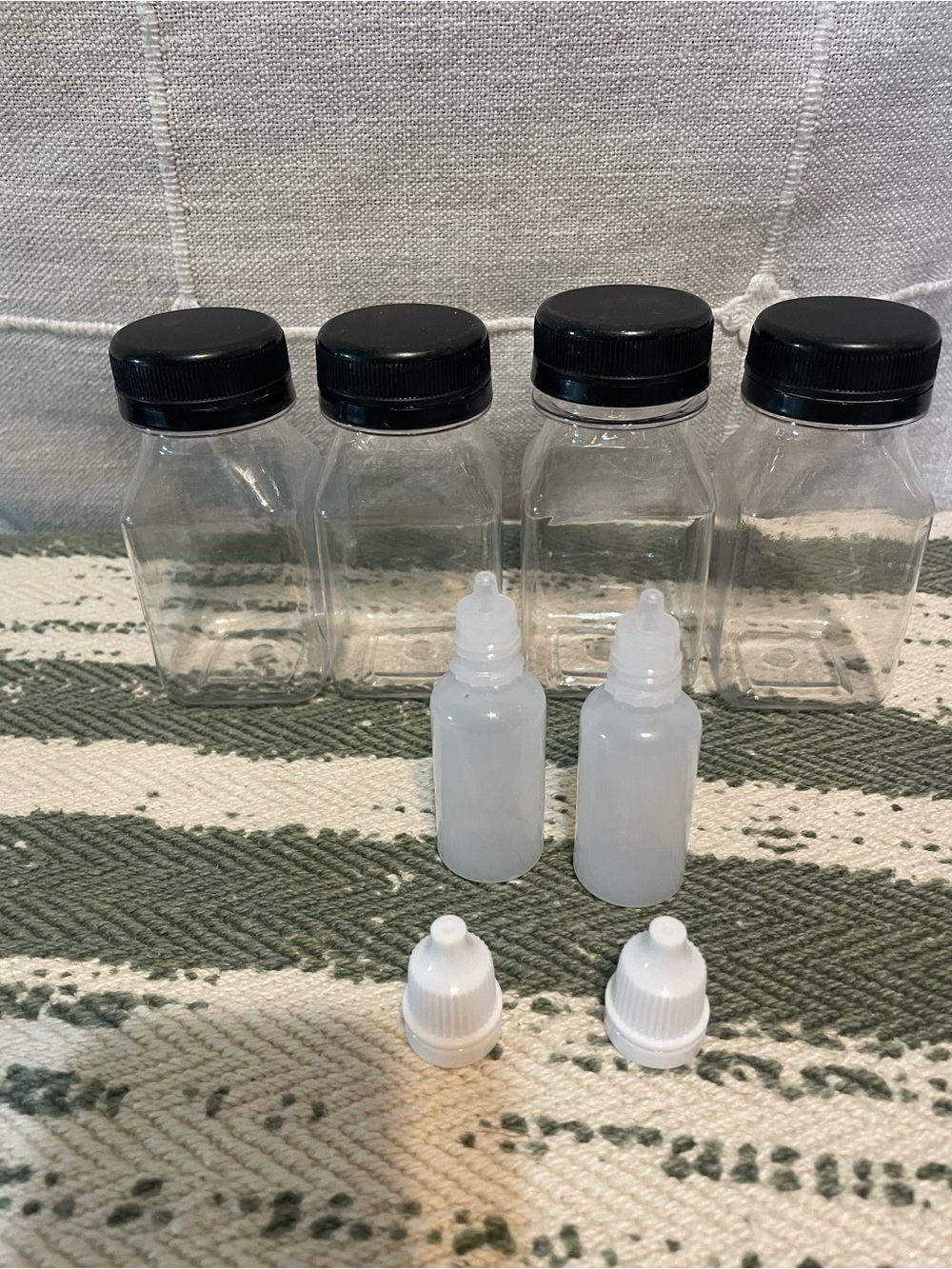 Brand new plastic containers. 4 medium size and 2 eye dropper size